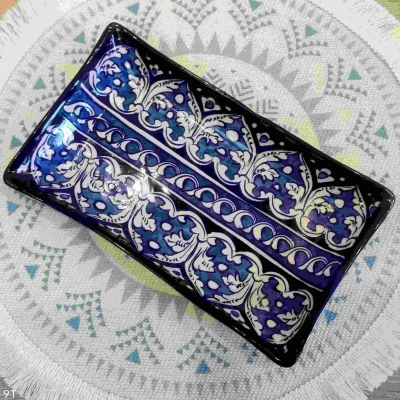 Medium rectangular ceramic dish with white Zanjeer chain floral design on glossy deep blue base, Multani hand-painted pottery.